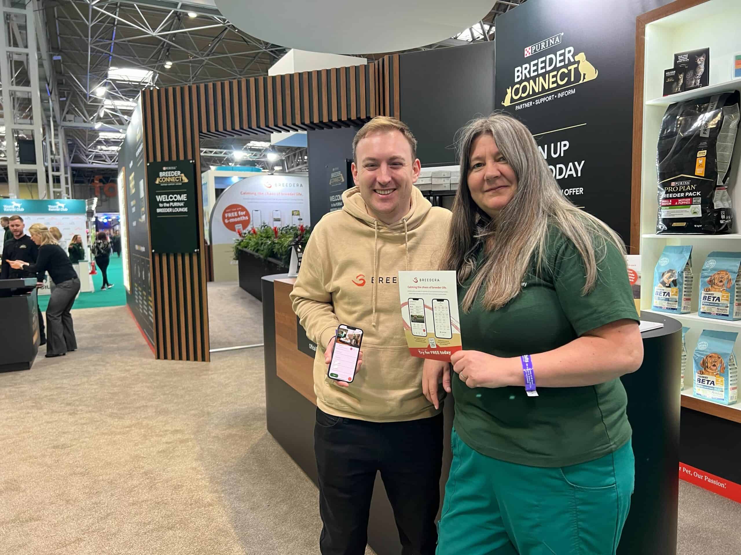 Breedera-at-Crufts-2023-Mike-with-a-Breeder Mike, Founder of Breedera at Crufts 2023 on the Breeder Connect Stand with Purina